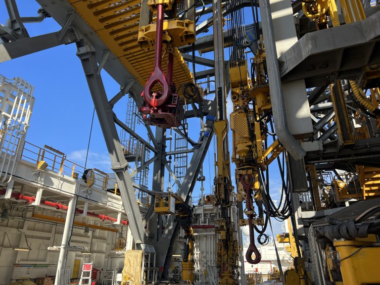 Dual Derrick Travelling Blocks with Top Drives